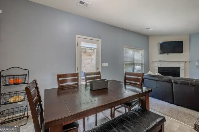 a view of a workspace with furniture