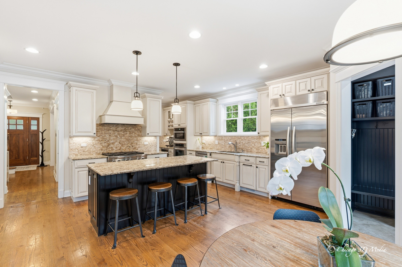 306 17th Street Wilmette, IL 60091 - Photo 12 of 48 a large kitchen with lots of counter space and stainless steel appliances