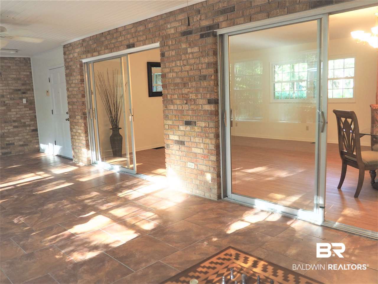 33420 Helms Lane Lillian, AL 36549 - Photo 25 of 35 LR opens to Sun room