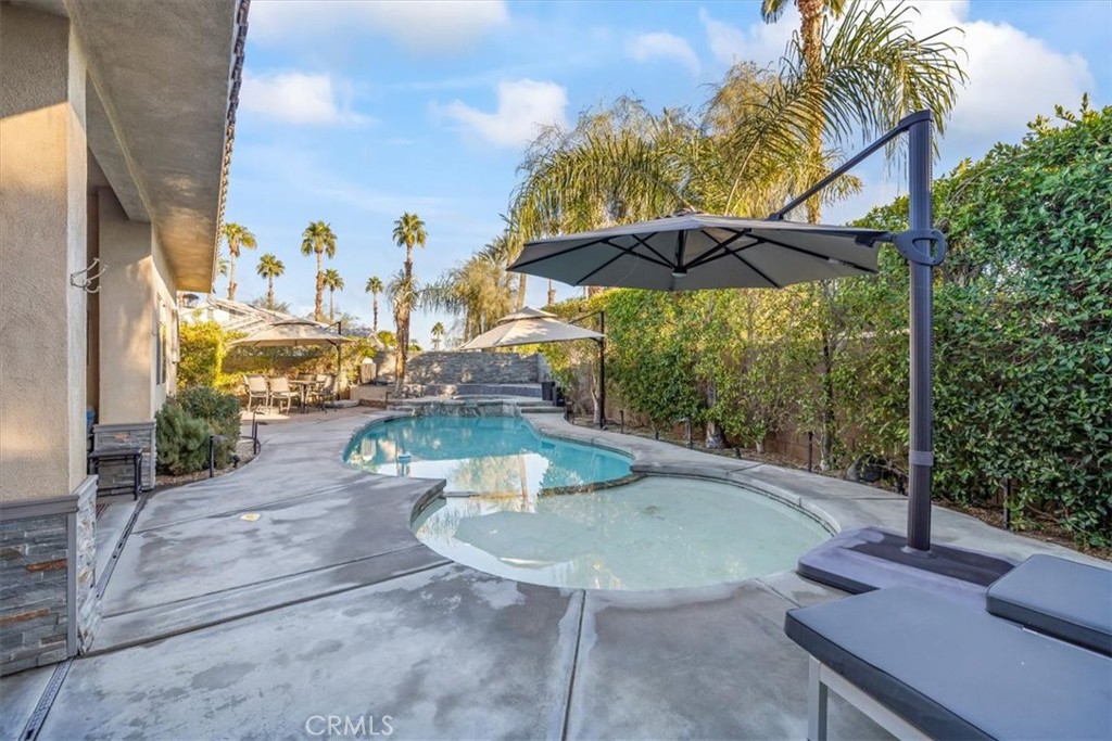 35678 Tranquil Place Cathedral City, CA 92234 - Photo 23 of 75 an outdoor view of house with outdoor seating