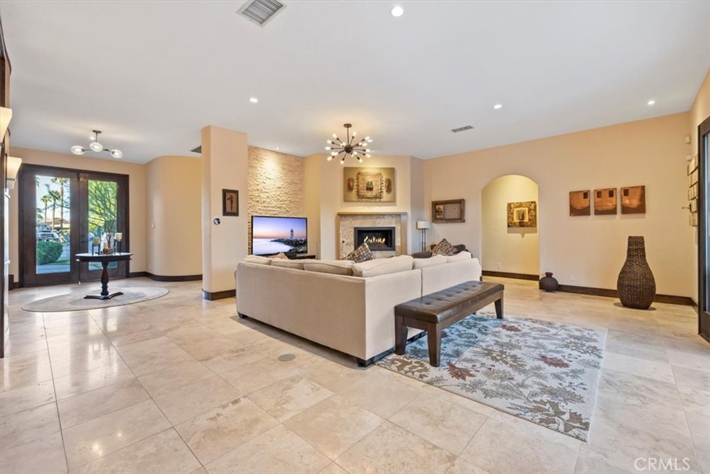 35678 Tranquil Place Cathedral City, CA 92234 - Photo 27 of 75 a living room with furniture and a flat screen tv