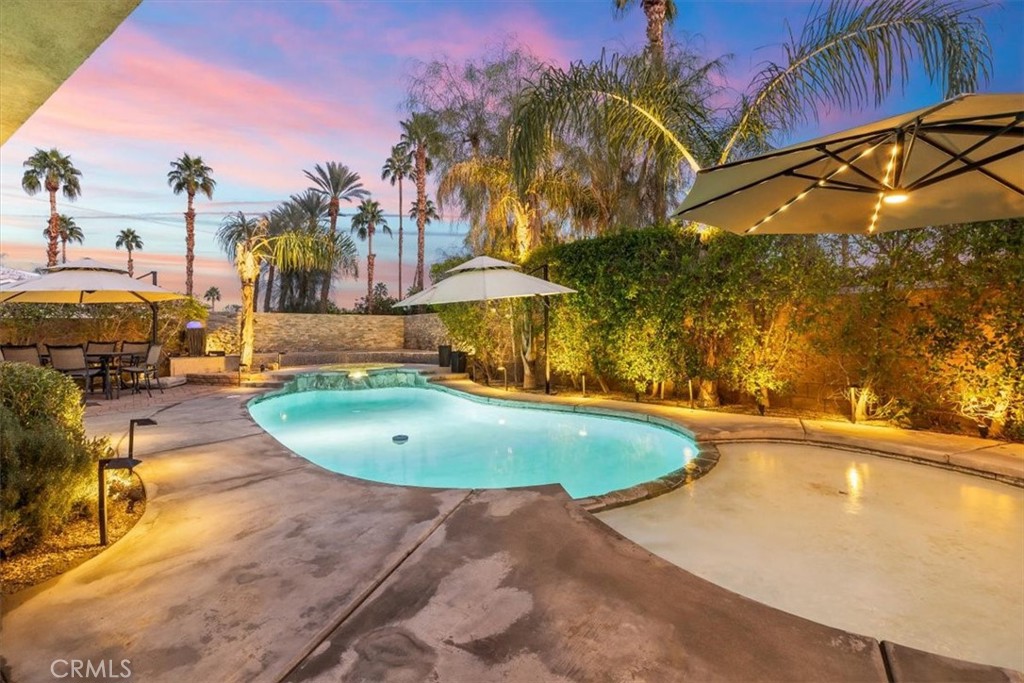 35678 Tranquil Place Cathedral City, CA 92234 - Photo 73 of 75 a view of a swimming pool with an outdoor seating