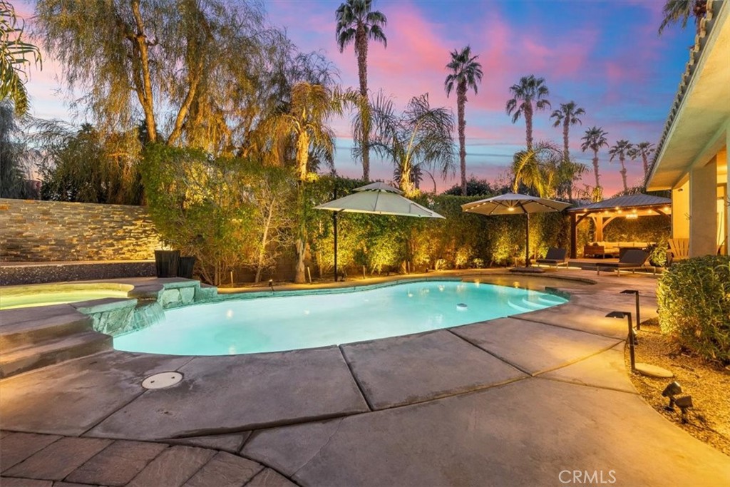 35678 Tranquil Place Cathedral City, CA 92234 - Photo 75 of 75 a view of a swimming pool with an outdoor space and seating area