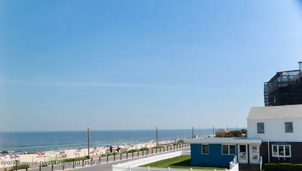 a view of city with ocean