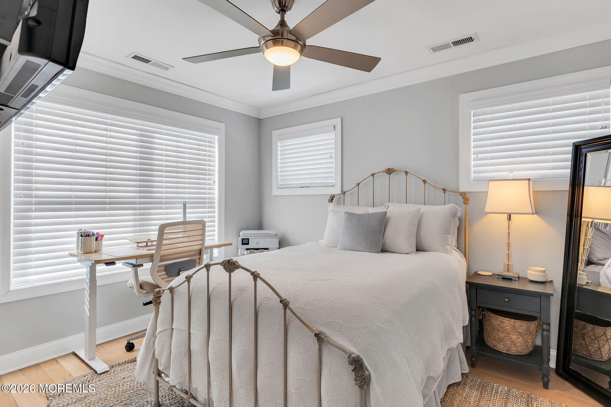 12 4th Street Highlands, NJ 07732 - Photo 20 of 41 a bedroom with a bed and wooden floor