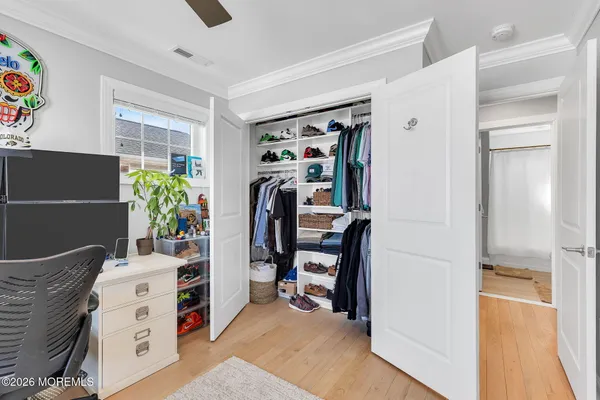 a kitchen with stainless steel appliances granite countertop a sink a stove and refrigerator