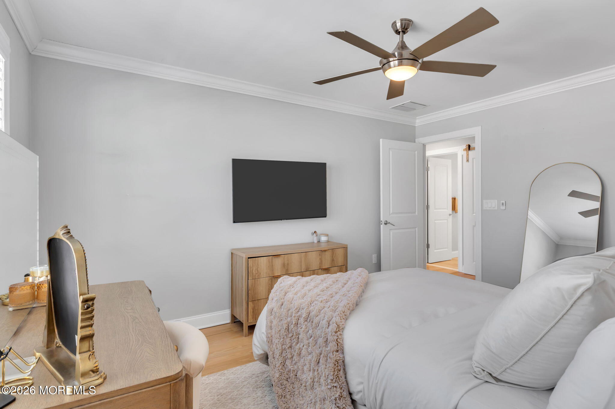 12 4th Street Highlands, NJ 07732 - Photo 27 of 41 a bedroom with a bed and a television