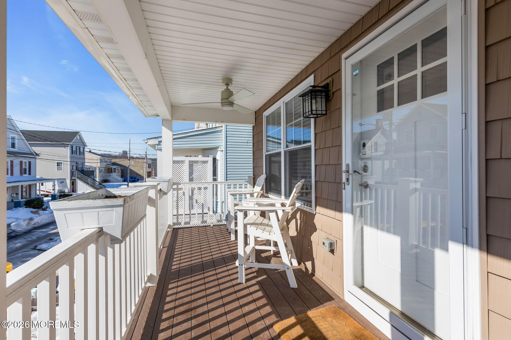 12 4th Street Highlands, NJ 07732 - Photo 32 of 41 a view of a patio with table and chairs with wooden floor