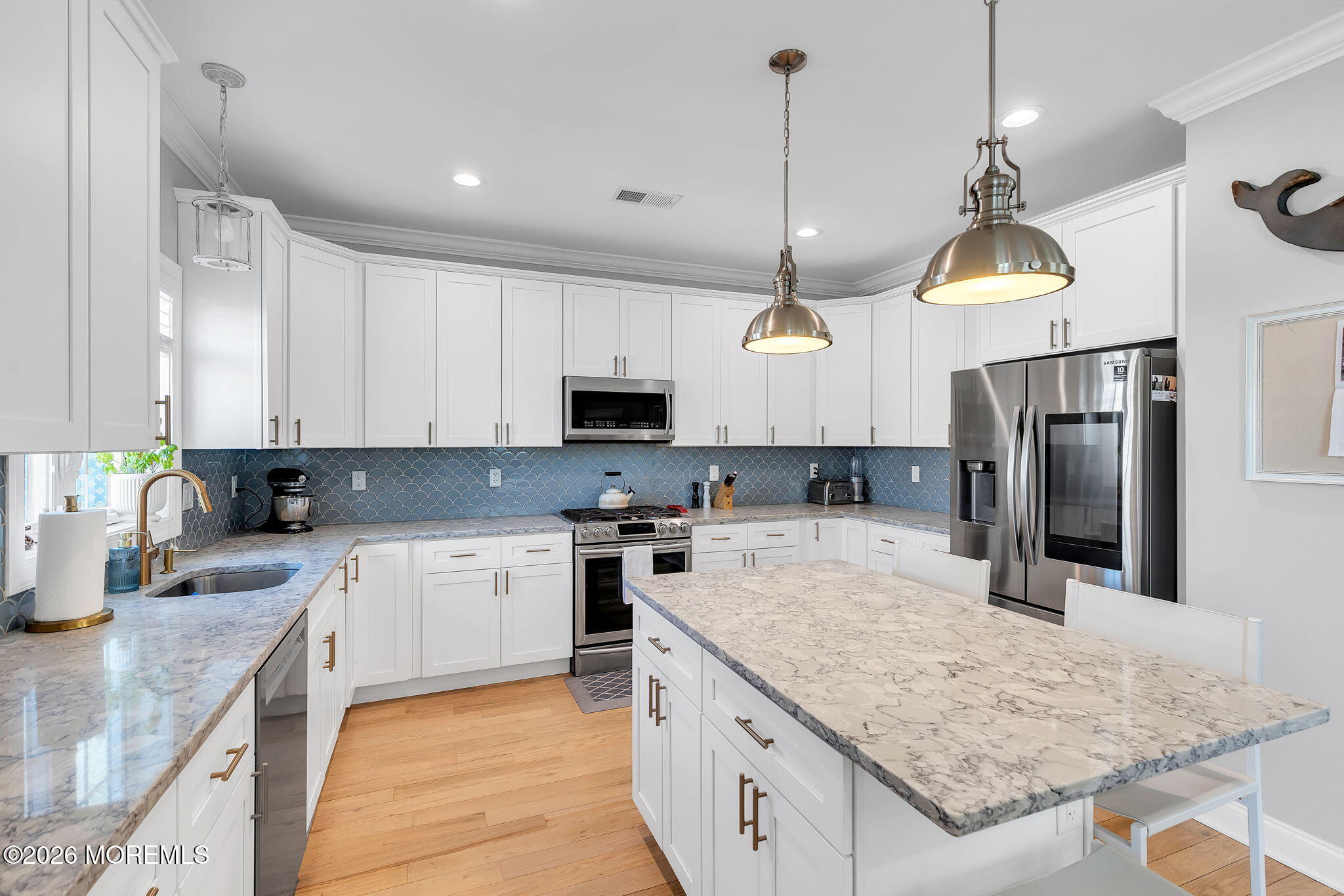 12 4th Street Highlands, NJ 07732 - Photo 33 of 41 a kitchen with stainless steel appliances granite countertop a sink a stove and refrigerator