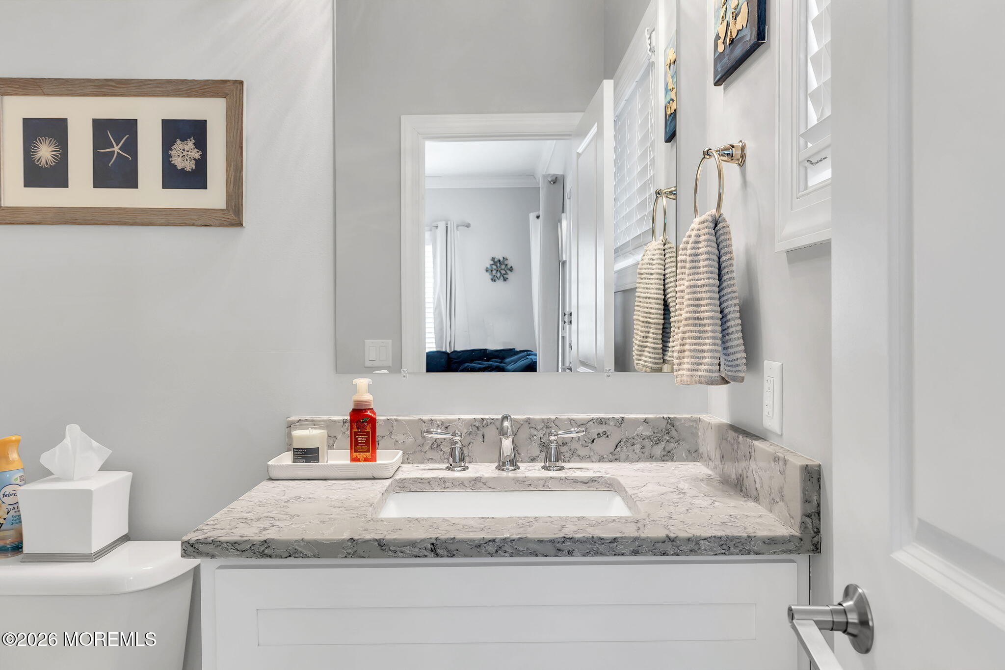 12 4th Street Highlands, NJ 07732 - Photo 34 of 41 a bathroom with a granite countertop sink and a mirror