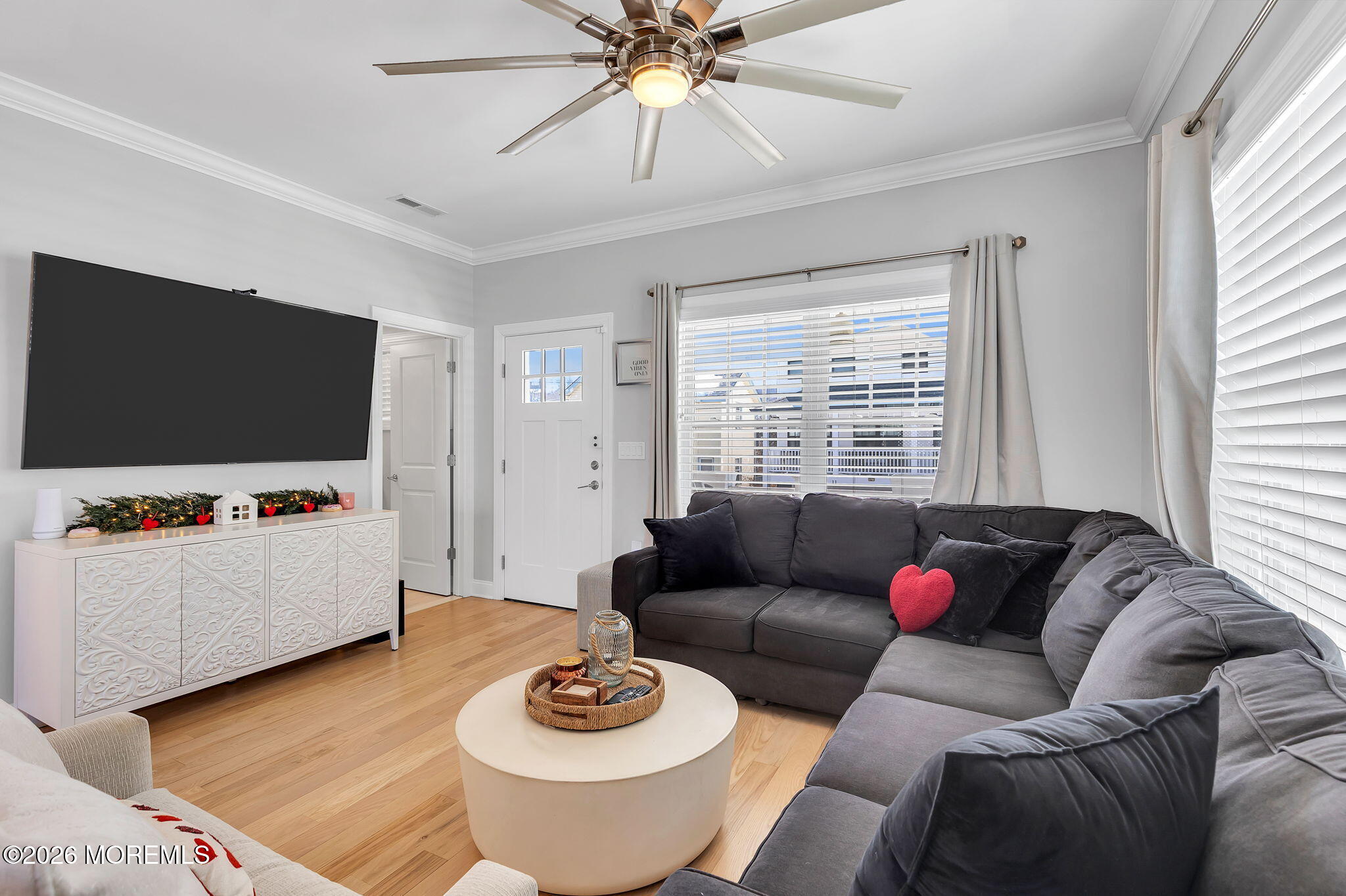 12 4th Street Highlands, NJ 07732 - Photo 6 of 41 a living room with furniture and a flat screen tv