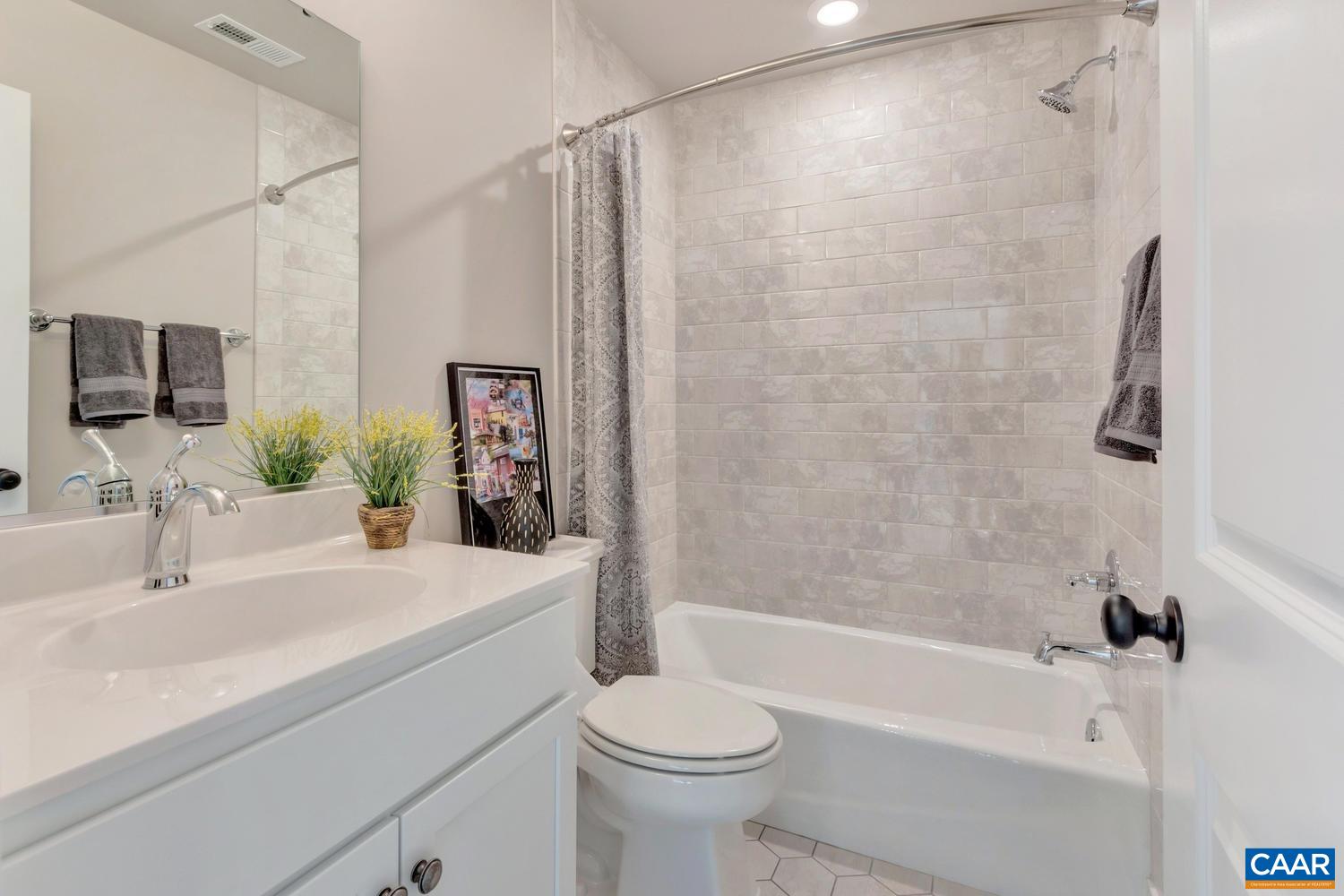 1300 Steep Rock Place Charlottesville, VA 22911 - Photo 46 of 60 a bathroom with a sink toilet and shower