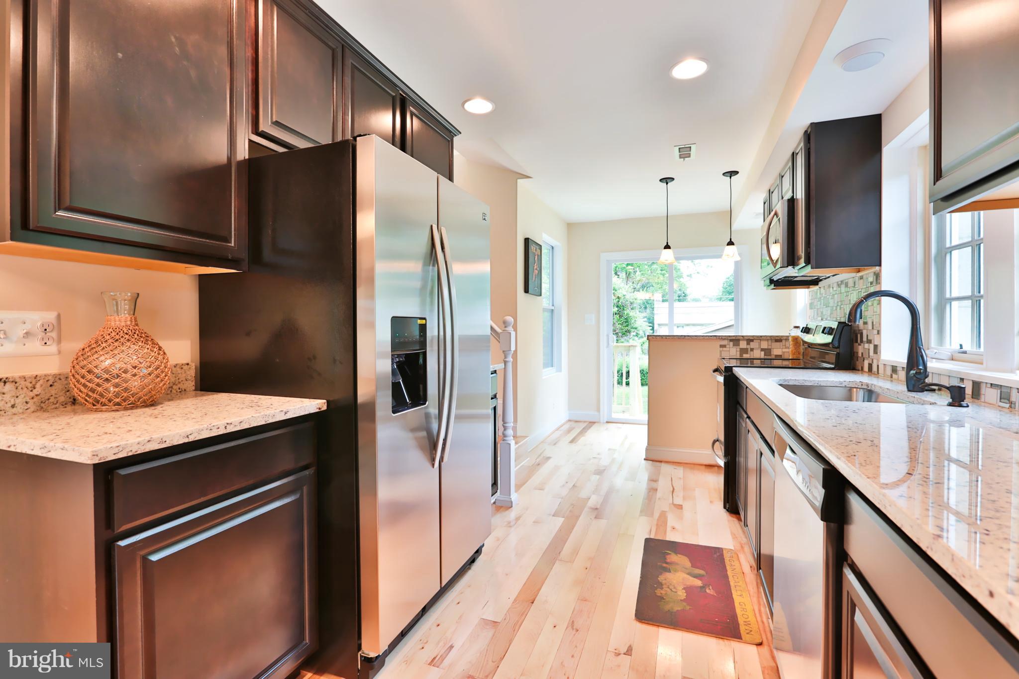 3606 Rusty Rock Road Randallstown, MD 21133 - Photo 10 of 30 Pass Thru Kitchen to with Abundant Cabinet Space