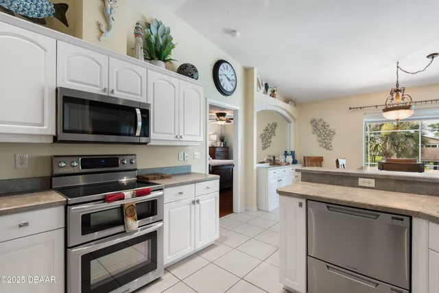 a bathroom with a granite countertop sink mirror and double