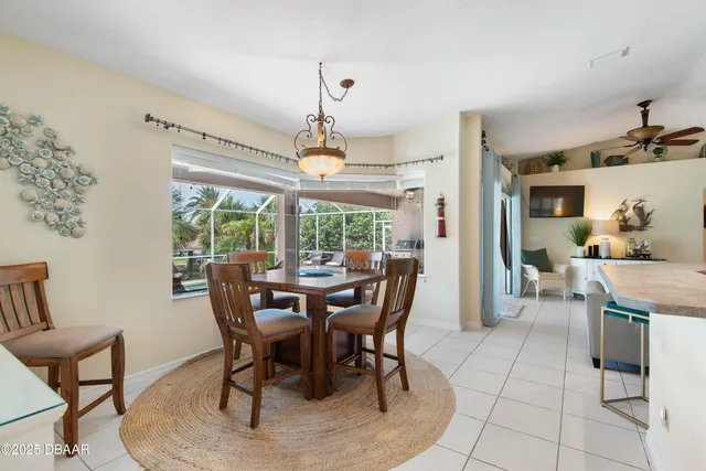 a bathroom with a granite countertop sink mirror and shower