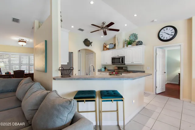 a bathroom with a tub and shower