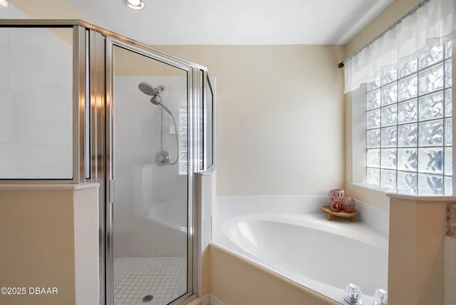 a bathroom with a toilet a sink a mirror and vanity