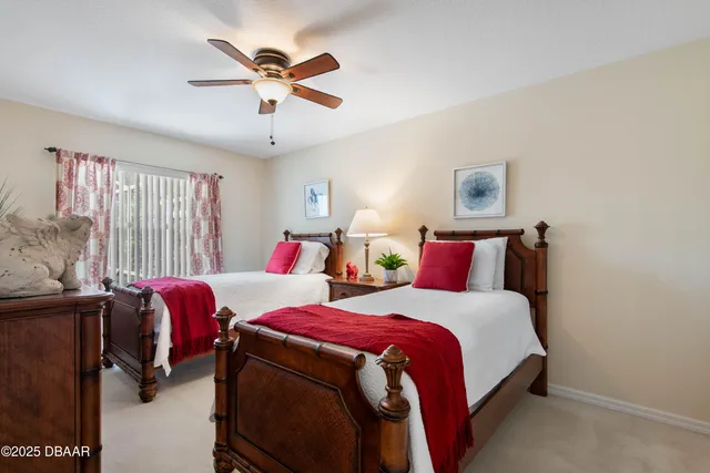 a lobby with furniture and a floor to ceiling window