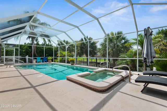 a view of a chairs and tables in the patio