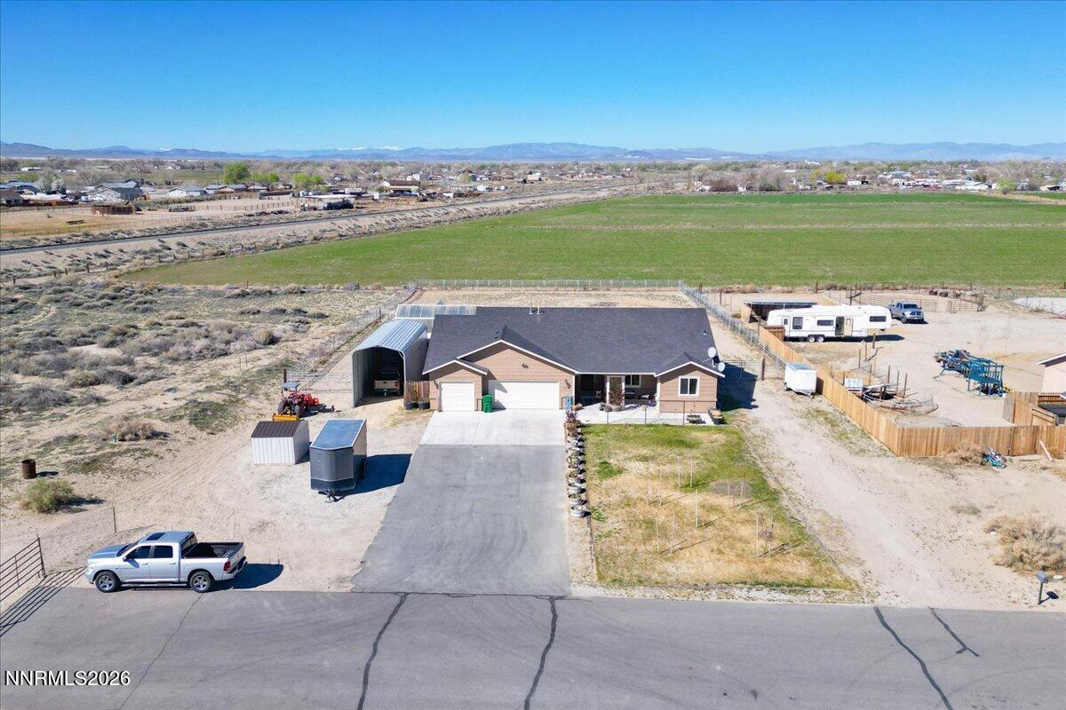 1197 Sky Ridge Drive Fallon, NV 89406 - Photo 57 of 79 a view of a swimming pool with a yard