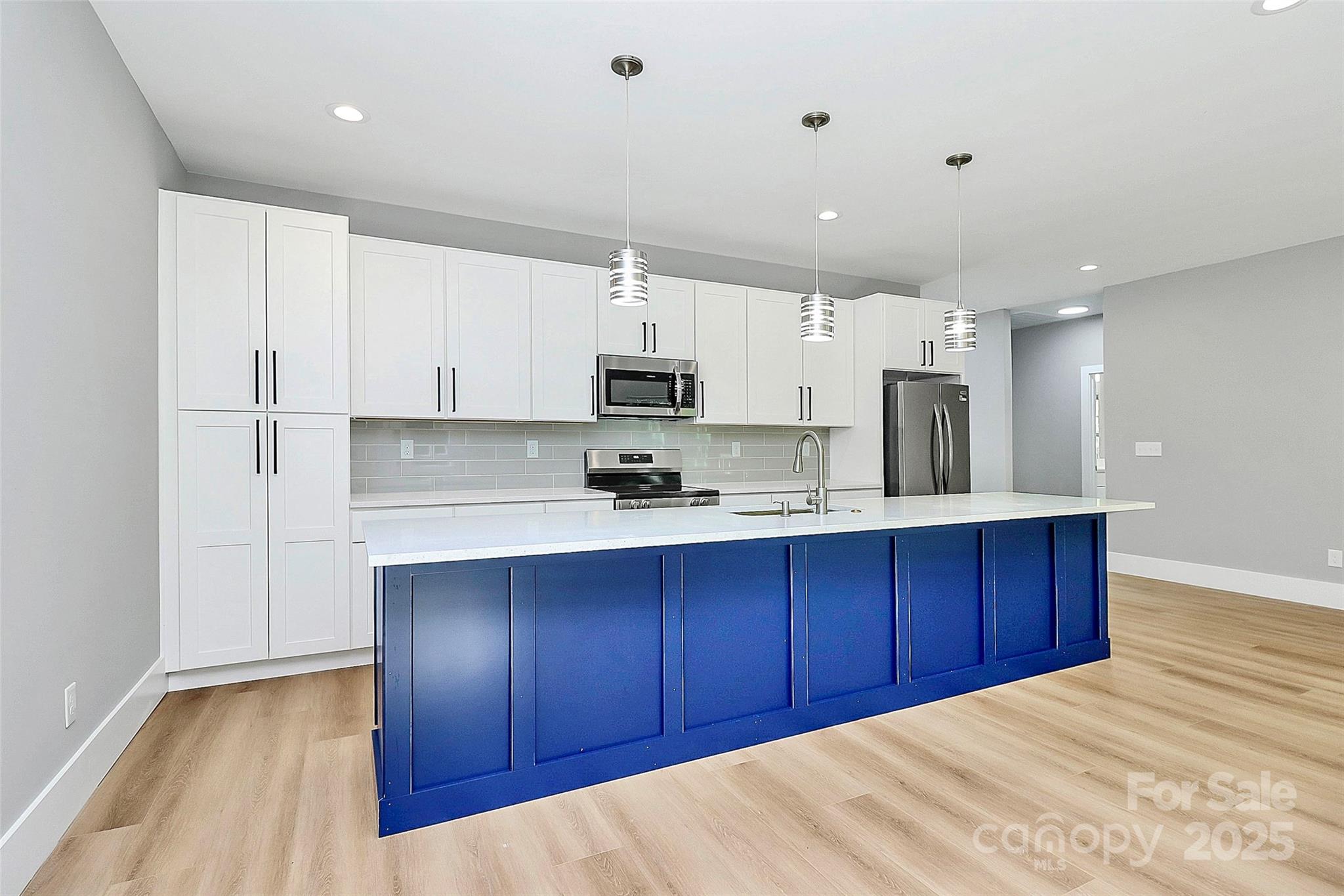 5516 Old York Road Rock Hill, SC 29732 - Photo 16 of 38 a kitchen with stainless steel appliances granite countertop a stove a sink and a refrigerator