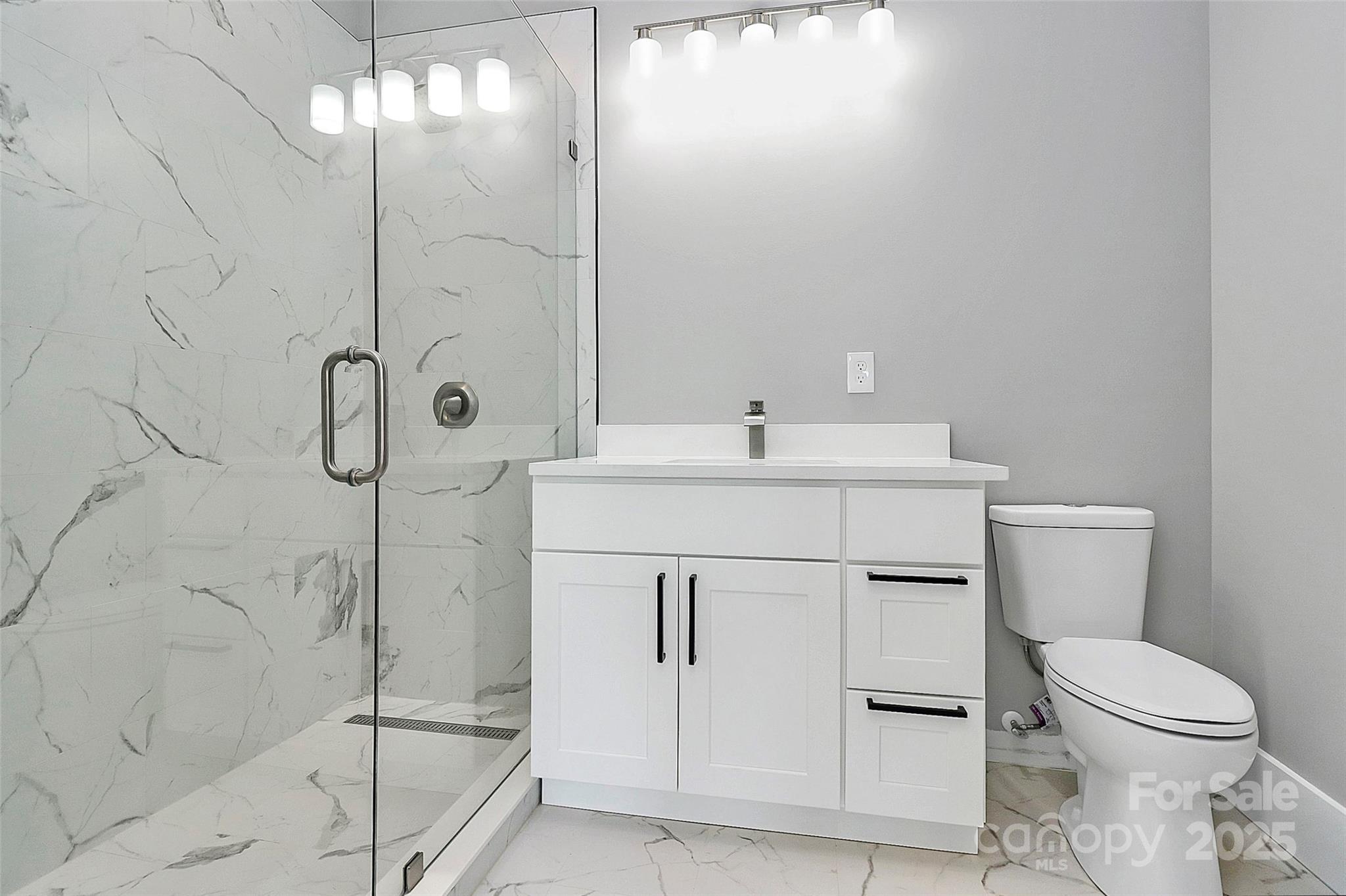 5516 Old York Road Rock Hill, SC 29732 - Photo 23 of 38 a bathroom with a sink toilet and shower