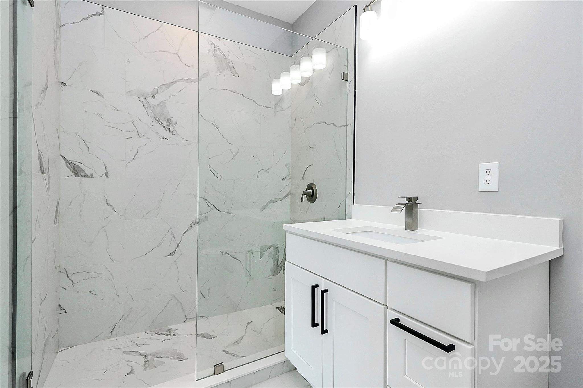 5516 Old York Road Rock Hill, SC 29732 - Photo 24 of 38 a bathroom with a sink shower and a mirror