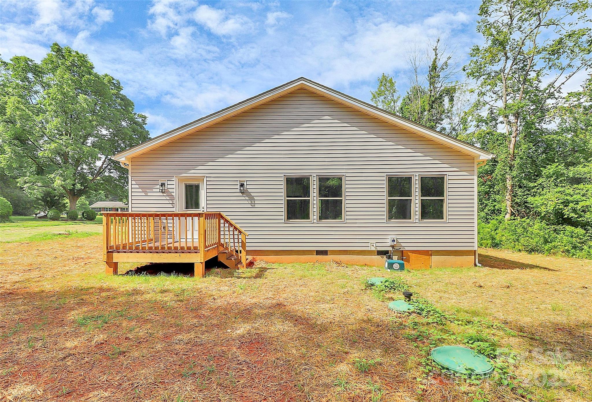 5516 Old York Road Rock Hill, SC 29732 - Photo 35 of 38 a view of a house with a yard and wooden fence