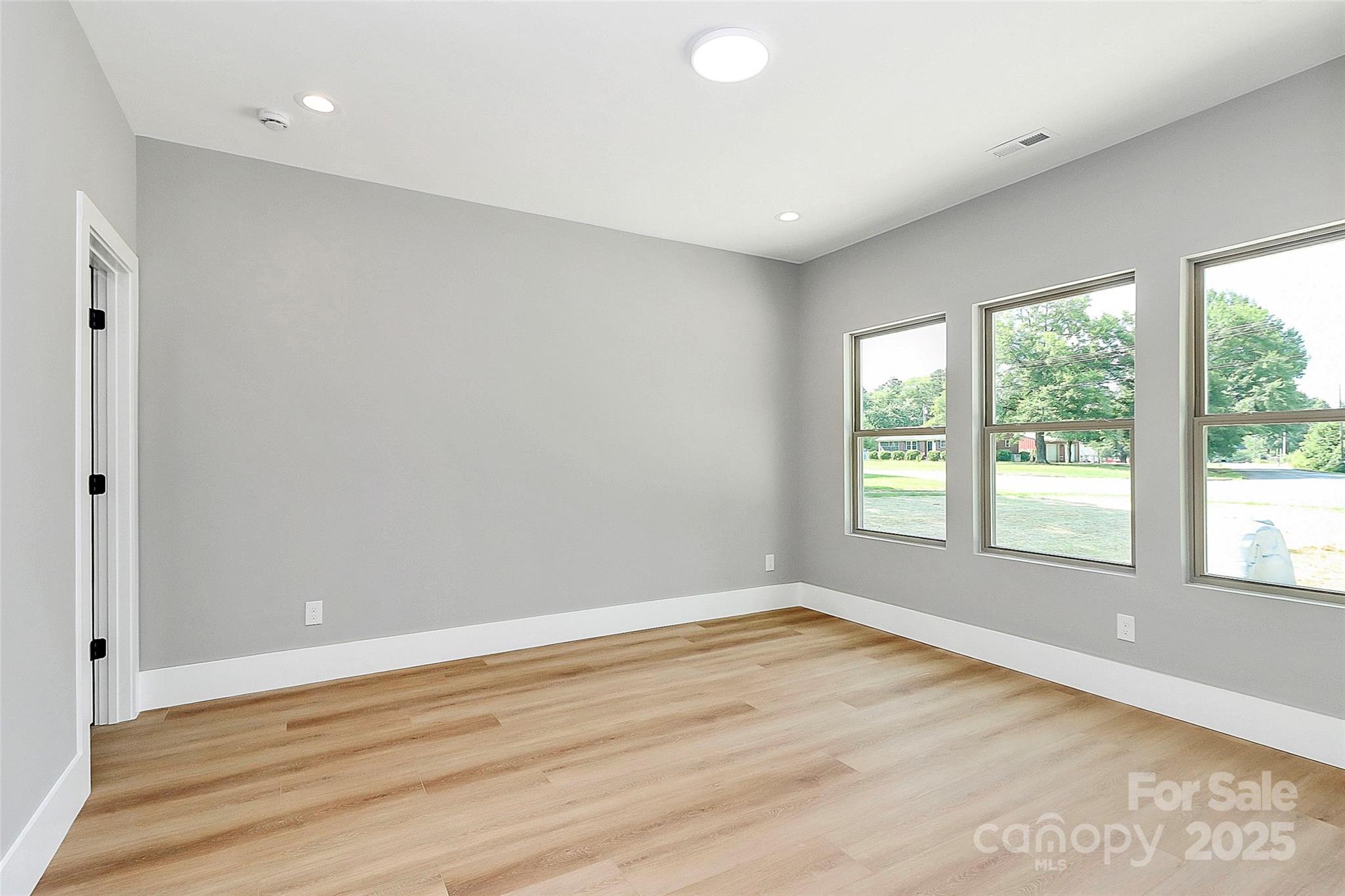 5516 Old York Road Rock Hill, SC 29732 - Photo 6 of 38 wooden floor in an empty room with a window