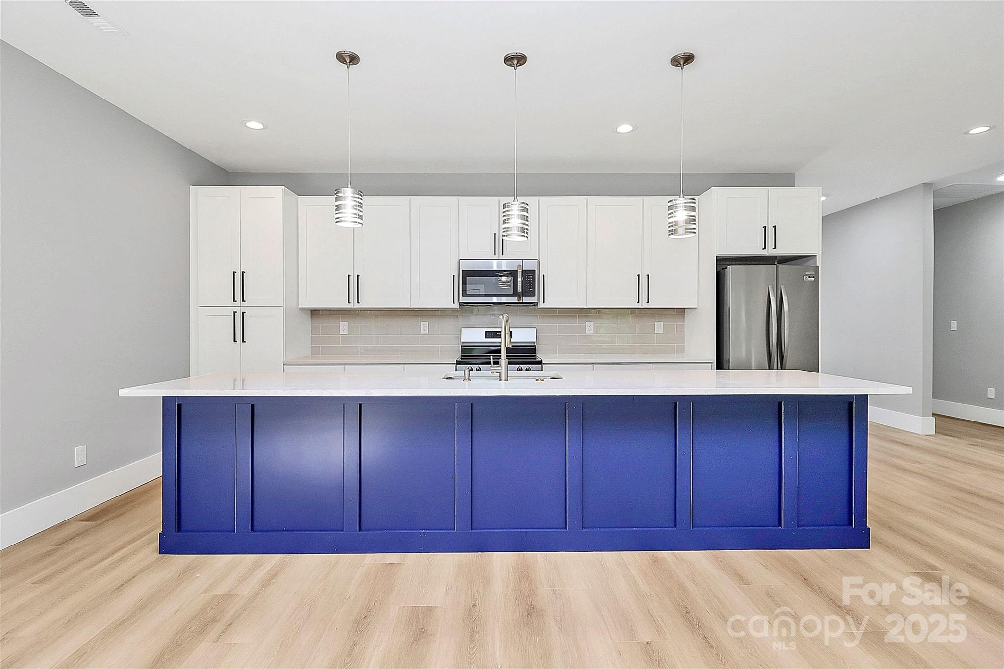 5516 Old York Road Rock Hill, SC 29732 - Photo 8 of 38 a kitchen with wooden cabinets and a sink