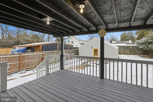 a view of a balcony with wooden floor