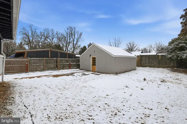 a view of a backyard of the house