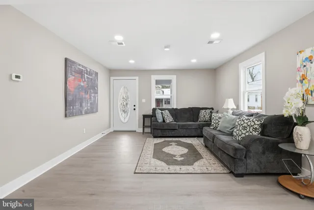 a living room with furniture and a couch