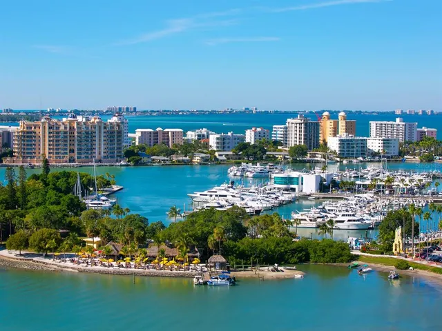 a view of pool with outdoor seating and yard