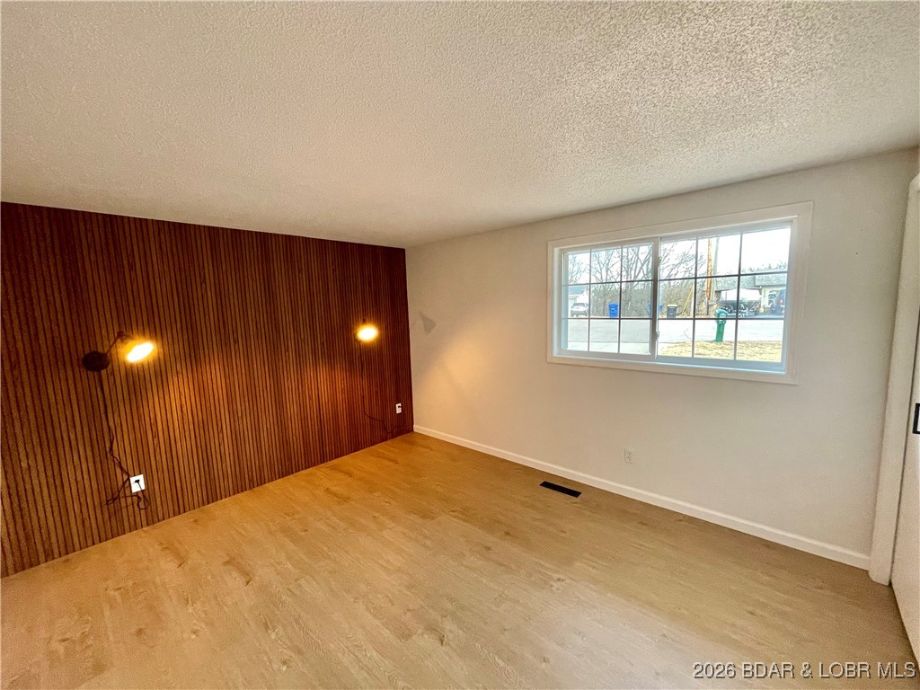 193 North High Street Camdenton, MO 65020 - Photo 11 of 19 Large Bedroom 1 upstairs.