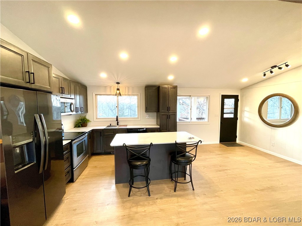 193 North High Street Camdenton, MO 65020 - Photo 14 of 19 Kitchen with island and dining area.