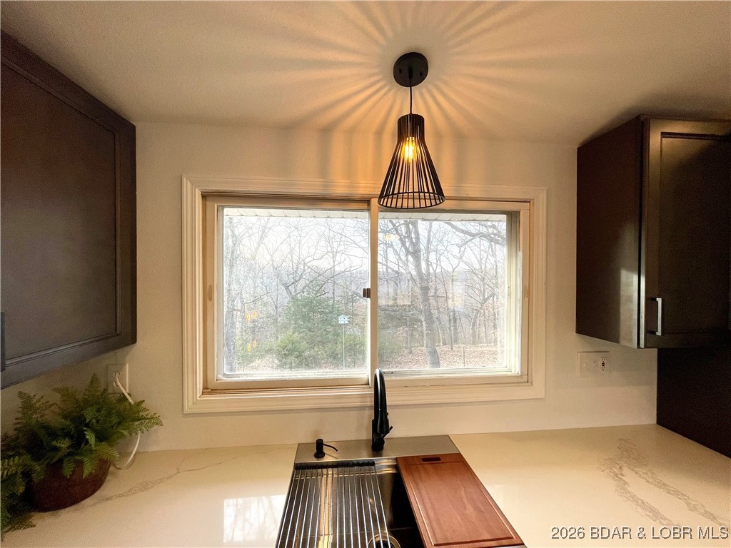 193 North High Street Camdenton, MO 65020 - Photo 6 of 19 Kitchen sink with views of the acreage in the back