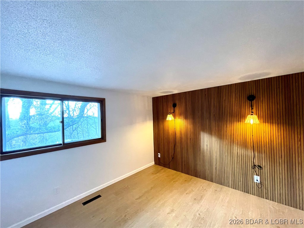 193 North High Street Camdenton, MO 65020 - Photo 10 of 19 Bedroom #2 upstairs.