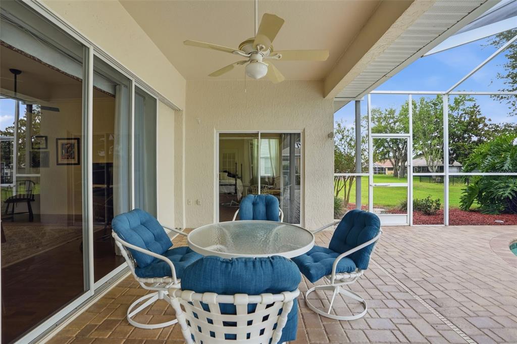 14228 Presteign Lane Spring Hill, FL 34609 - Photo 72 of 89 a view of a dining room with furniture window and outside view