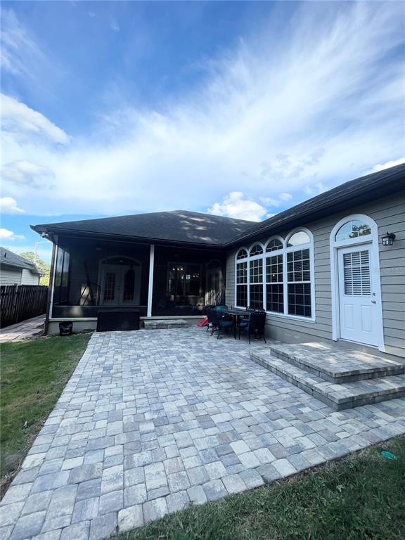 2244 Northwest 101st Street Gainesville, FL 32606 - Photo 35 of 39 a view of a house with garden and porch