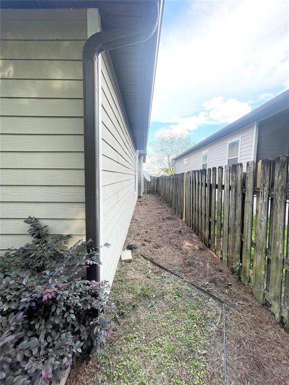 2244 Northwest 101st Street Gainesville, FL 32606 - Photo 36 of 39 a view of a backyard with pathway