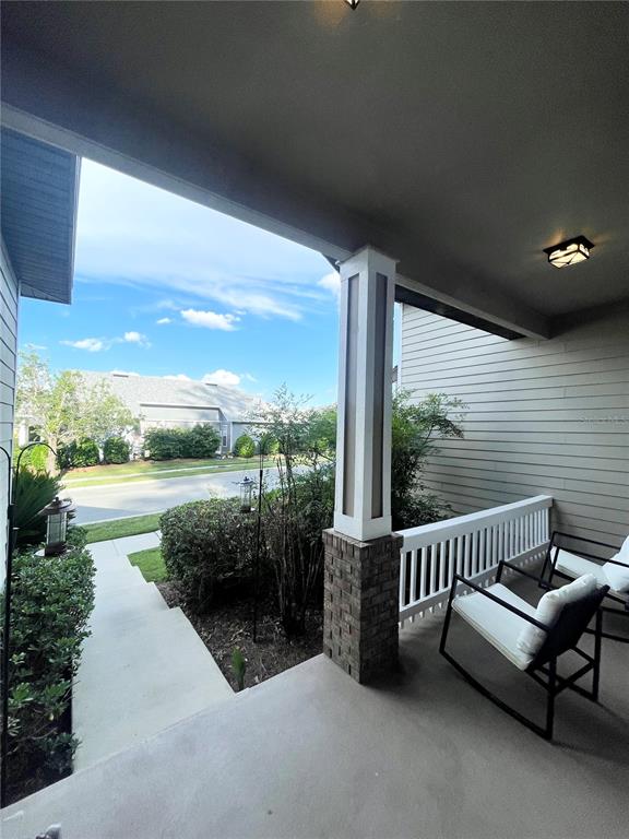 2244 Northwest 101st Street Gainesville, FL 32606 - Photo 6 of 39 a view of a patio with a table and chairs