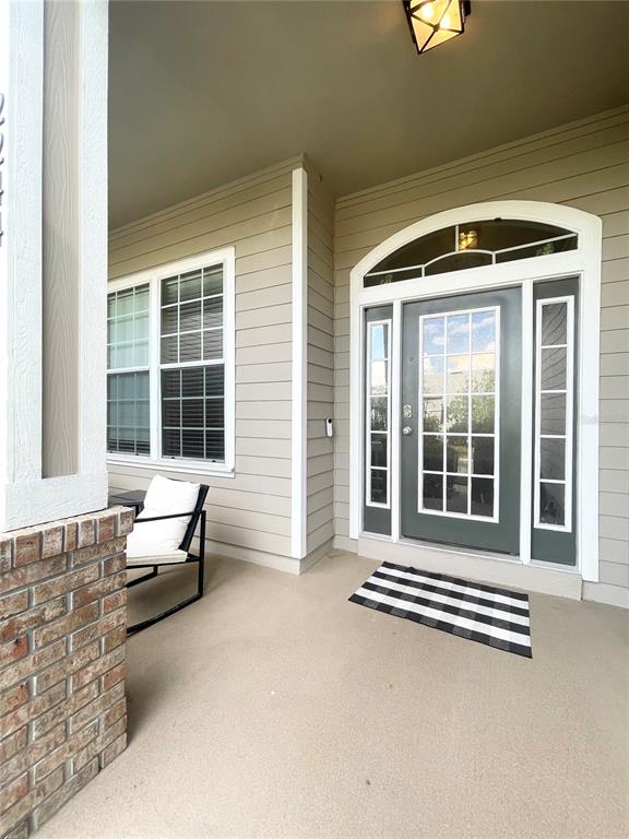 2244 Northwest 101st Street Gainesville, FL 32606 - Photo 8 of 39 a living room with furniture and a window
