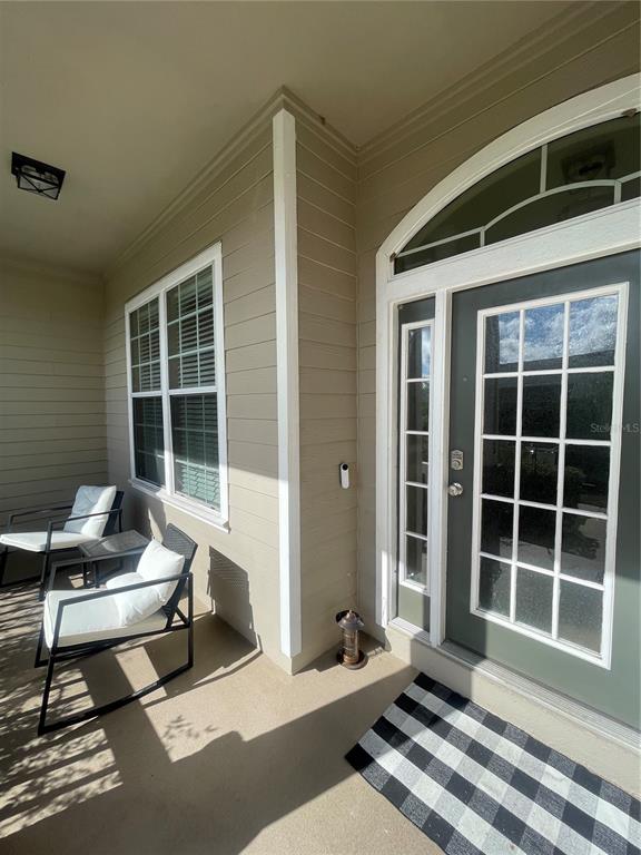 2244 Northwest 101st Street Gainesville, FL 32606 - Photo 9 of 39 a building outdoor space with patio furniture and windows
