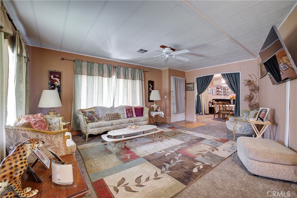 3700 Buchanan Street, Unit 105 Corona, CA 92503 - Photo 7 of 30 a living room with furniture