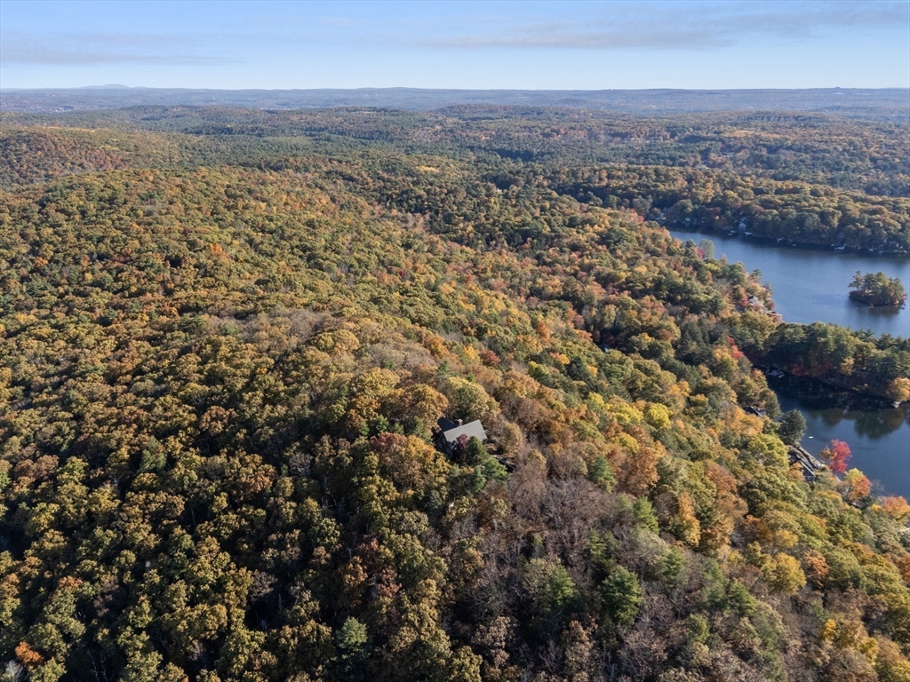 274 Brookfield Road Sturbridge, MA 01518 - Photo 8 of 30 an aerial view of residential building and lake in back