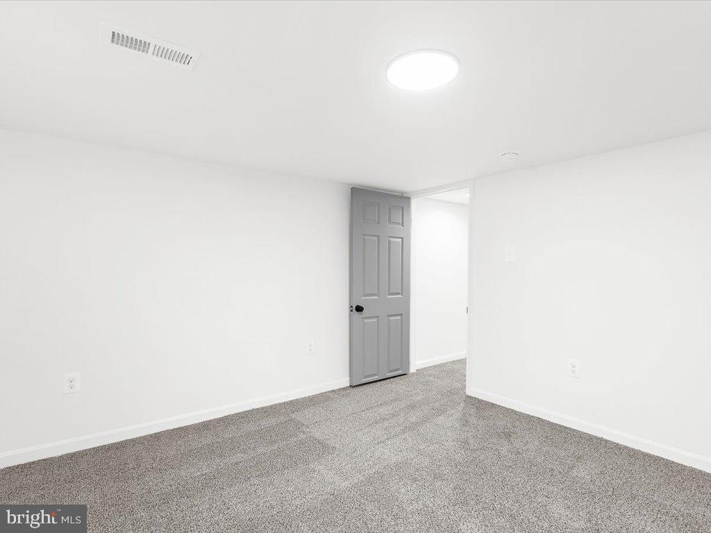 313 North Hammonds Ferry Road Linthicum Heights, MD 21090 - Photo 30 of 39 a view of an empty room