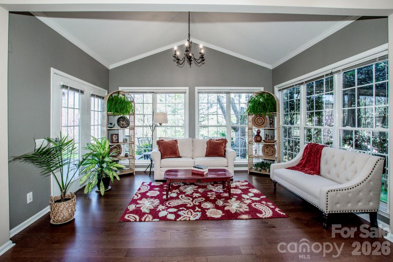 150 Coronilla Road Mooresville, NC 28117 - Photo 1 of 39 a living room with furniture and a large window