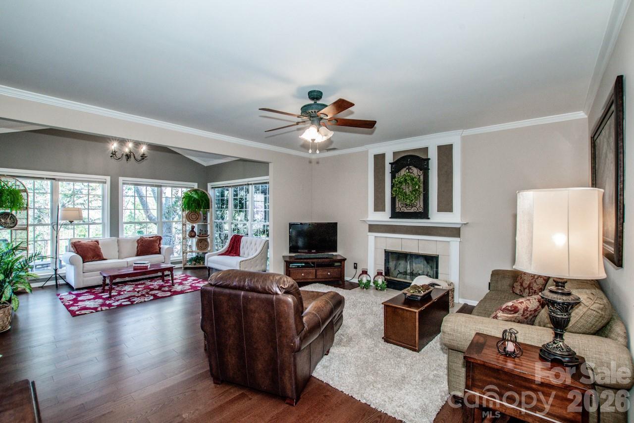 150 Coronilla Road Mooresville, NC 28117 - Photo 11 of 39 a living room with furniture fireplace and flat screen tv