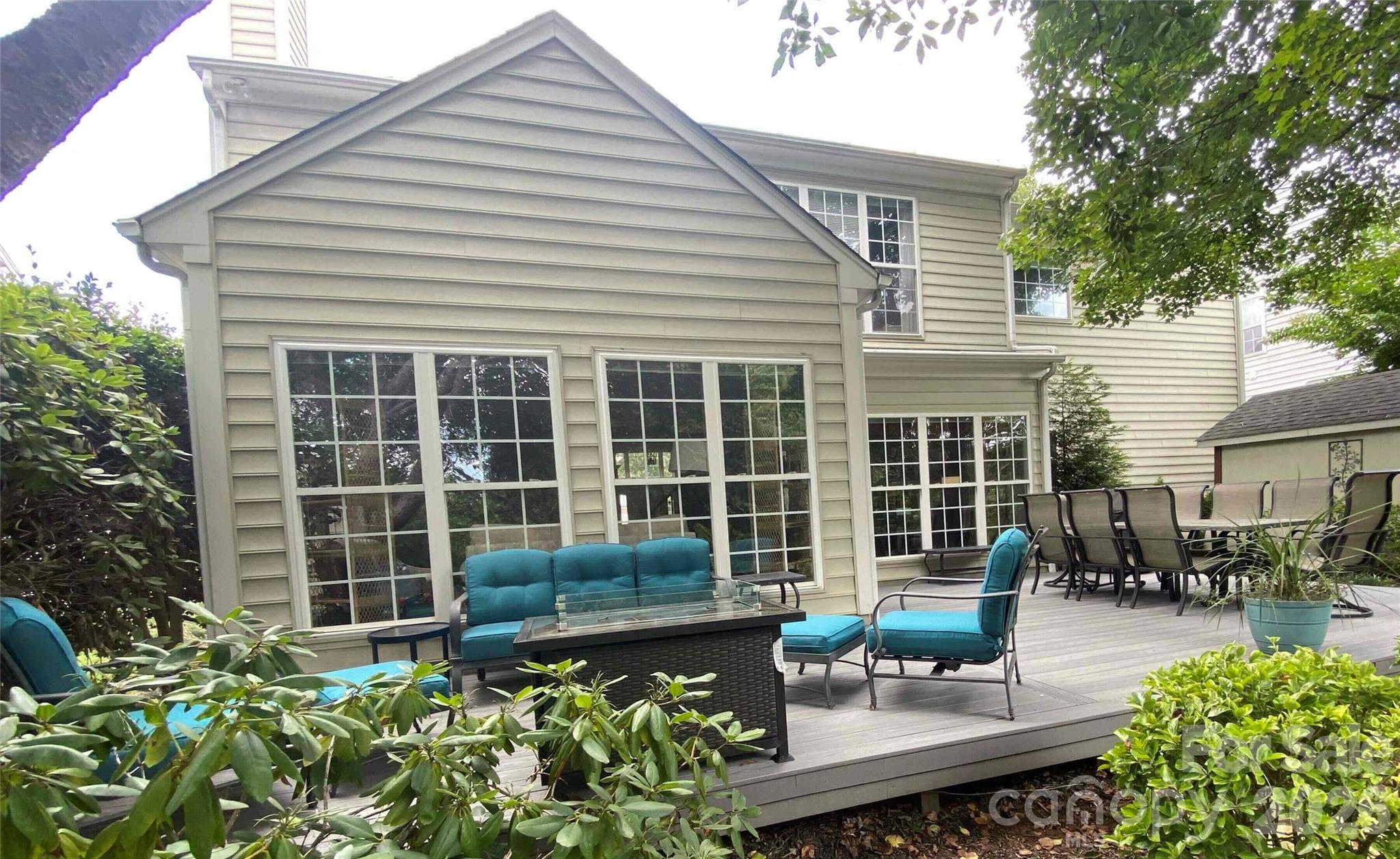 150 Coronilla Road Mooresville, NC 28117 - Photo 32 of 39 a front view of a house with patio